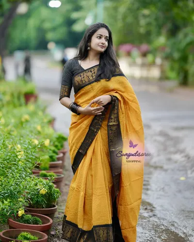 Mustard with black zari kattam saree